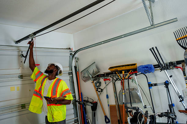 Professional Garage Door Panel Replacement technician working in Justice, OK